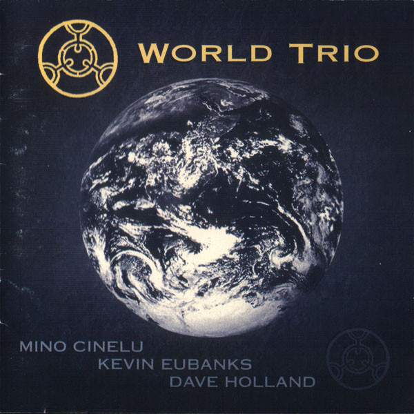 MINO CINELU - Mino Cinelu, Kevin Eubanks, Dave Holland ‎: World Trio cover 