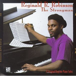 REGINALD R. ROBINSON - The Strongman cover 