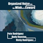 PETE RODRIGUEZ (TRUMPET) Organized Noise Trio (feat. Pete Rodriguez, Rudy Royston & Ricky Rodriguez) : The Wink of a Coward album cover
